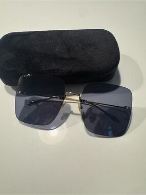 Gucci Rimless Sunglasses with Dark Smoke Lenses and Gold Bridge